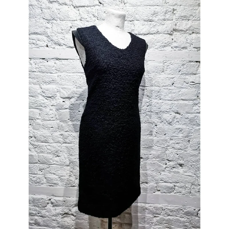 Price Drop Alert DIANE VON FURSTENBERG
BOUCLE LEATHER DRESS