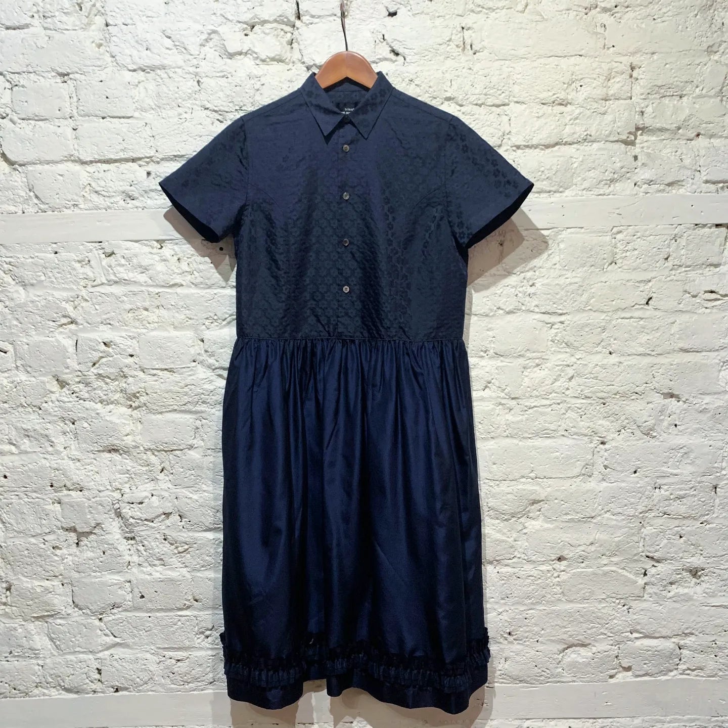 Limited Stock COMME DES GARÇONS TRICOT
NAVY BUTTON FRONT DRESS
SIZE S